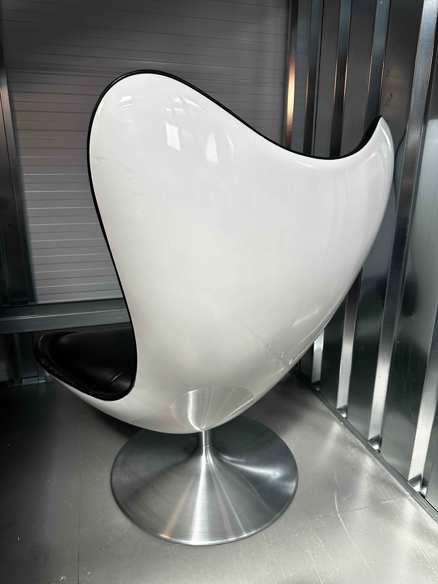 Conran Glove Swivel Chair – Black Faux Leather & White Shell Base
